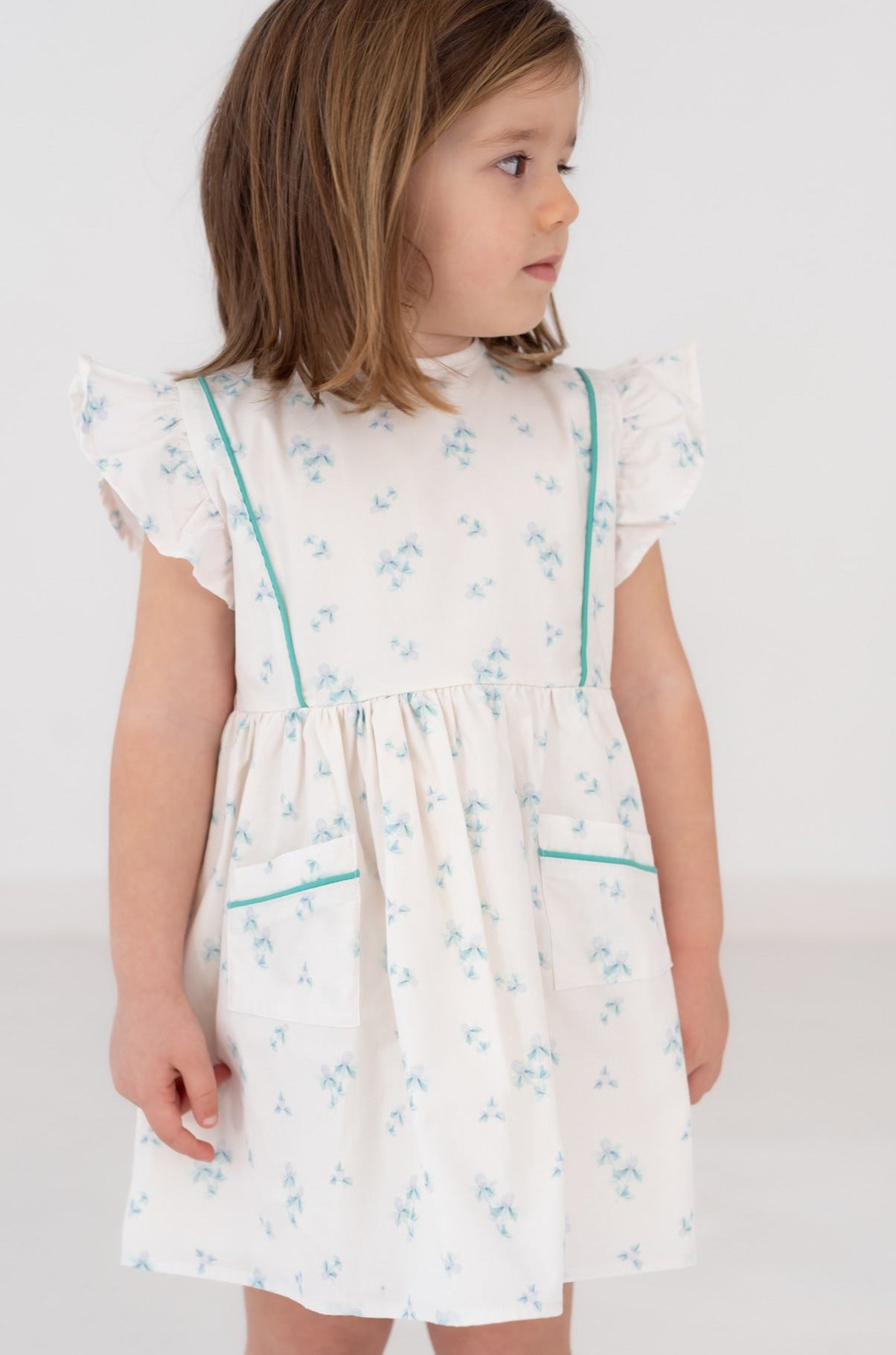 VESTIDO VOLANTE HOMBRO. ESTAMPADO DUNA