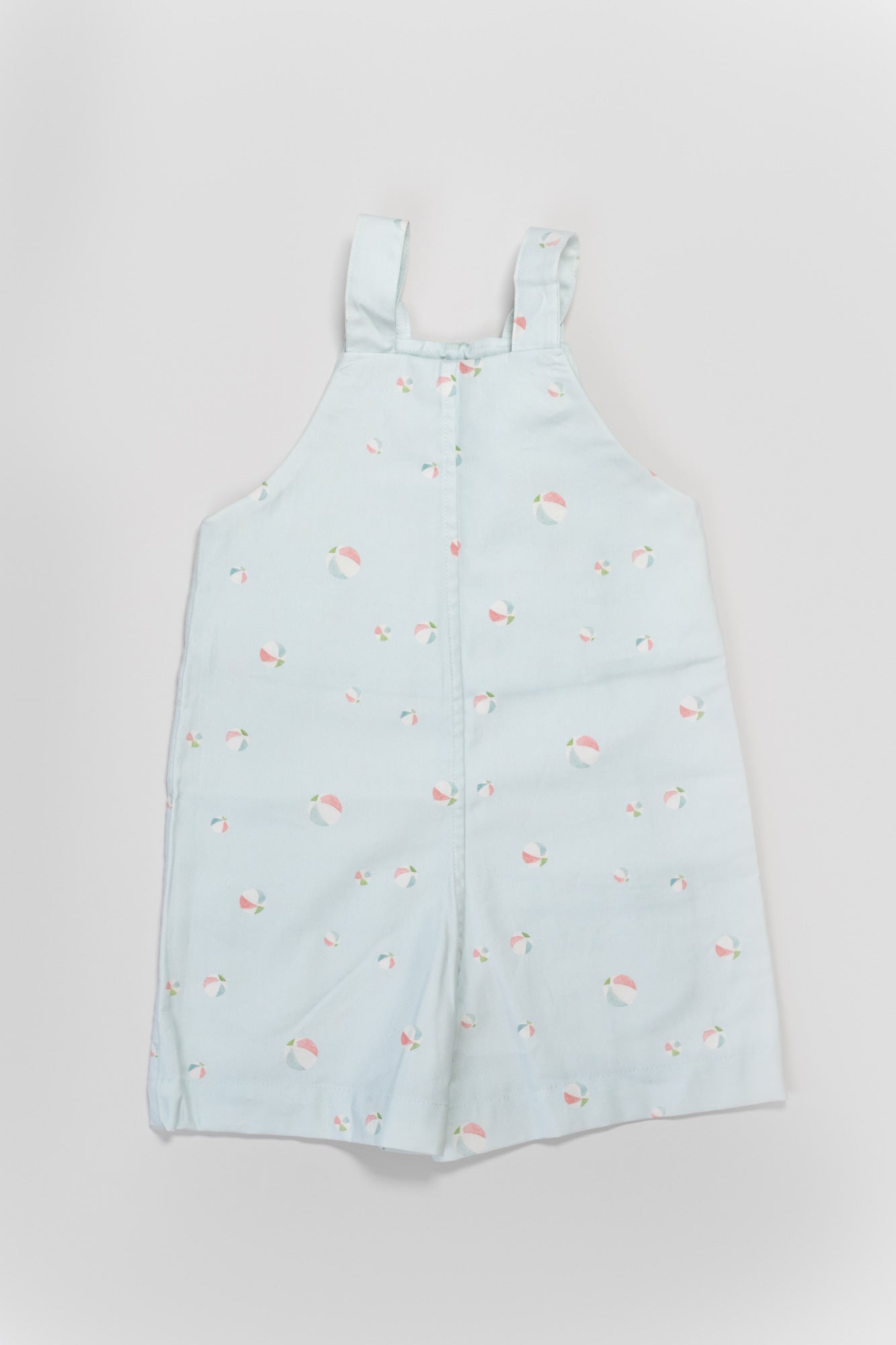 PETO PANTALÓN CORTO. ESTAMPADO BALONES